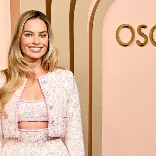 margot robbie looks leggy in barbie pink vintage chanel skirt suit as she attends very star studded