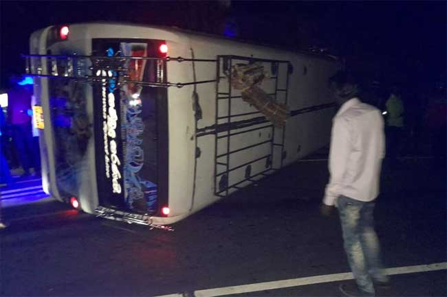 At least 8 injured after bus topples on Radella Shortcut Road